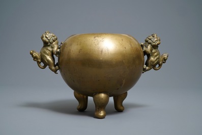 A large Chinese bronze tripod censer on stand, 19th C.