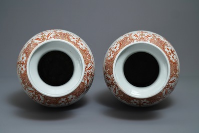 A pair of large Chinese iron red and gilt 'phoenixes' vases, Qianlong