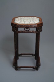 A Chinese huali wooden stand with famille rose plaque, Jiaqing