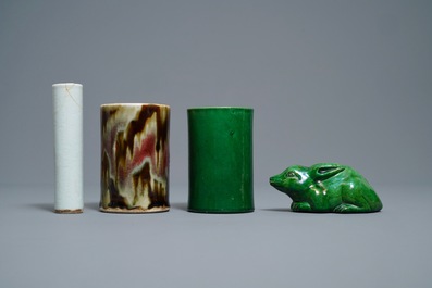Two Chinese monochrome relief-decorated brush pots, an incense tube and a rabbit, 18/19th C.