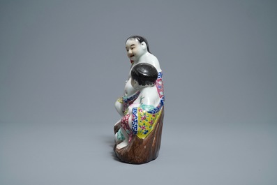 A Chinese famille rose 'two boys' group, impressed seal marks, Republic