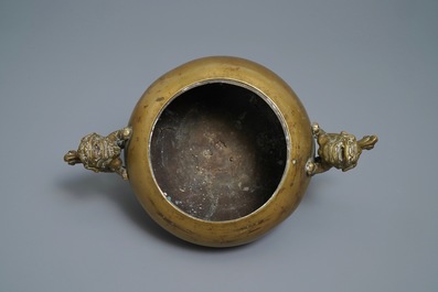A large Chinese bronze tripod censer on stand, 19th C.