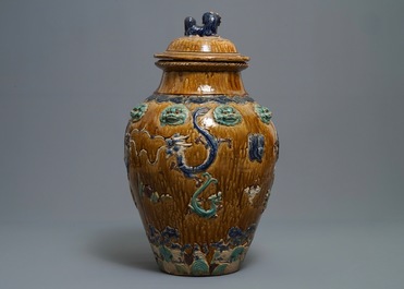 A large Chinese polychrome stoneware martaban jar and cover, Ming/Qing