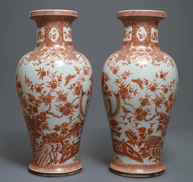 A pair of large Chinese iron red and gilt 'phoenixes' vases, Qianlong