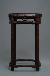 A Chinese huali wooden stand with famille rose plaque, Jiaqing