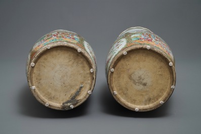 A pair of large Chinese Canton famille rose vases, 19th C.