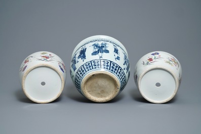 A pair of Chinese famille rose jardini&egrave;res and a blue and white example, 19th C.