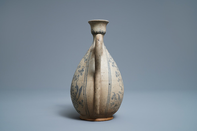 An Annamese blue and white jug with fish and lotus scrolls, Vietnam, 15/16th C.