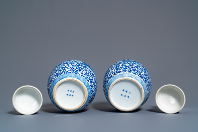 A pair of Chinese blue and white covered 'phoenix' jars, Kangi mark, 19th C.