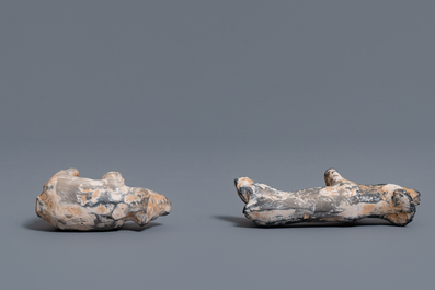 A Chinese earthenware model of a stable and five animals, Han