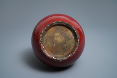 A Chinese monochrome sang-de-boeuf bottle vase, 19th C.