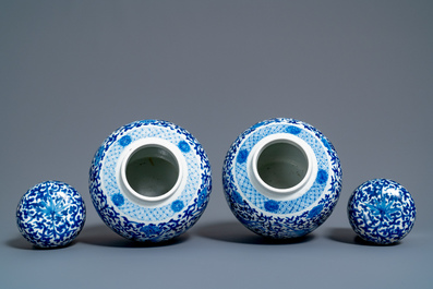 A pair of Chinese blue and white covered 'phoenix' jars, Kangi mark, 19th C.