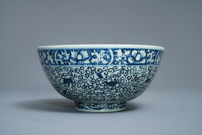 A Chinese blue and white bowl with a qilin and flower scrolls, Wanli