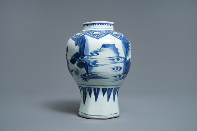 A Chinese blue and white baluster vase with figures in a landscape, Transitional period