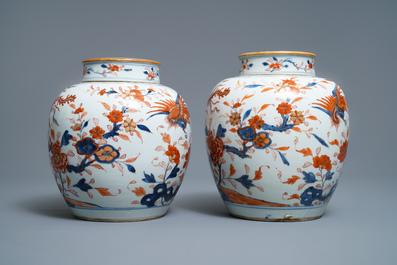 A pair of Chinese Imari-style 'qilin and phoenix' jars and covers, Kangxi