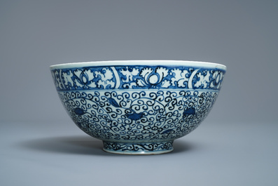 A Chinese blue and white bowl with a qilin and flower scrolls, Wanli