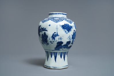 A Chinese blue and white baluster vase with figures in a landscape, Transitional period