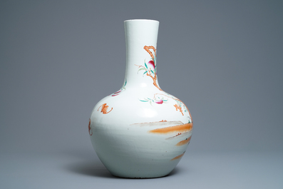 A Chinese famille rose 'peaches' vase, Qianlong mark, 19th C.