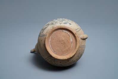 An Annamese blue and white jug with fish and lotus scrolls, Vietnam, 15/16th C.
