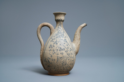 An Annamese blue and white jug with fish and lotus scrolls, Vietnam, 15/16th C.