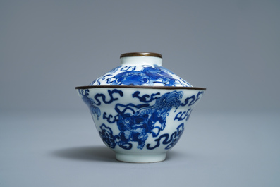 A Chinese blue and white Vietnamese market 'Bleu de Hue' covered bowl and saucer, 19th C.