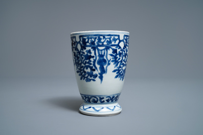 A Chinese blue and white beaker after a European silver model, Kangxi
