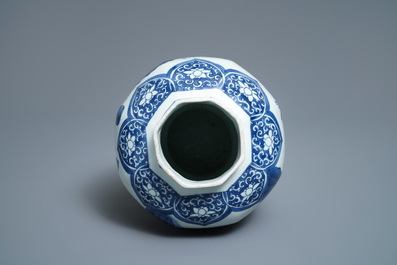 A Chinese blue and white baluster vase with figures in a landscape, Transitional period