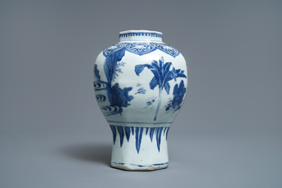 A Chinese blue and white baluster vase with figures in a landscape, Transitional period