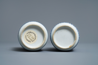 A pair of Chinese blue and white 'Buddhist emblems' rouleau vases, Kangxi