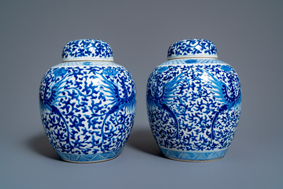 A pair of Chinese blue and white covered 'phoenix' jars, Kangi mark, 19th C.