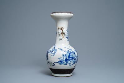 A Chinese blue, white and copper red Nanking crackle-glazed vase, 19th C.