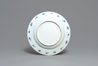 A Chinese blue and white dish after Cornelis Pronk: 'Dames au Parasol', Qianlong