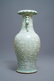 A large Chinese slip-decorated celadon-ground vase, 19th C.