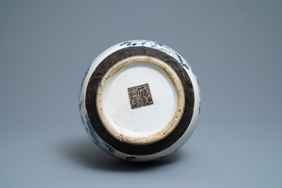 A Chinese blue, white and copper red Nanking crackle-glazed vase, 19th C.
