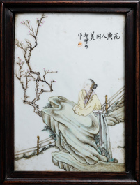 A Chinese wooden closet with 23 qianjiang cai plaques, 19/20th C.