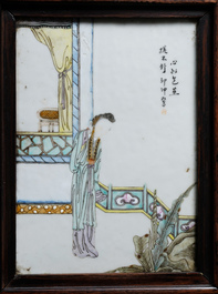 A Chinese wooden closet with 23 qianjiang cai plaques, 19/20th C.
