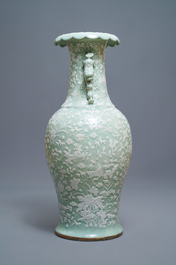 A large Chinese slip-decorated celadon-ground vase, 19th C.