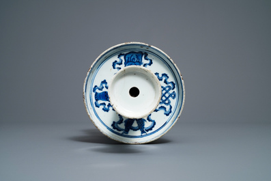 A large Chinese blue and white candleholder with floral design, Qianlong/Jiaqing