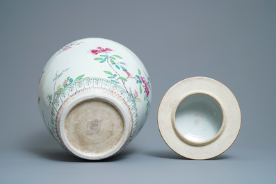 A large Chinese famille rose vase and cover with a bird on blossoming branches, Yongzheng