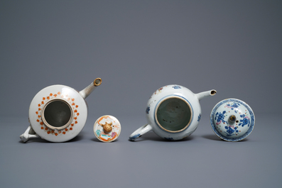 Five Chinese famille rose cups and saucers and two 'Mandarin' teapots, Yongzheng/Qianlong