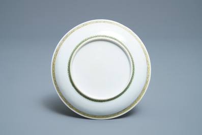 A Chinese famille rose cup and saucer after Cornelis Pronk: 'Doctor's visit', Qianlong