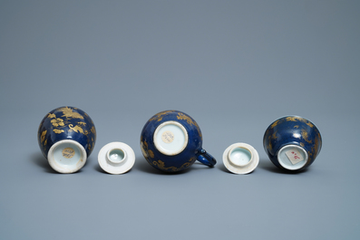A Chinese gilt-decorated powder blue cream jug, a tea caddy and a tea bowl with roosters, Yongzheng