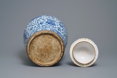 A pair of Chinese blue and white vases with faience replacement covers, Kangxi