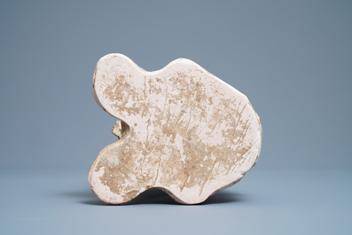 A Chinese straw-glazed stoneware 'earth spirit', Sui (581-617)