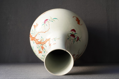 A Chinese famille rose 'peaches' vase, Qianlong mark, 19th C.