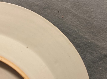 Seven Chinese famille rose plates with Luohan near a tiger, Qianlong