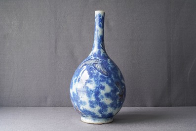 A Chinese blue, white and copper red 'dragon' vase, Qianlong/Jiaqing