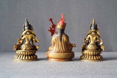 Five Sino-Tibetan gilt bronze Buddha figures, 19/20th C.