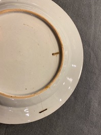 Seven Chinese famille rose plates with Luohan near a tiger, Qianlong