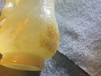 A Chinese celadon russet jade chilong-handled jug, Qing